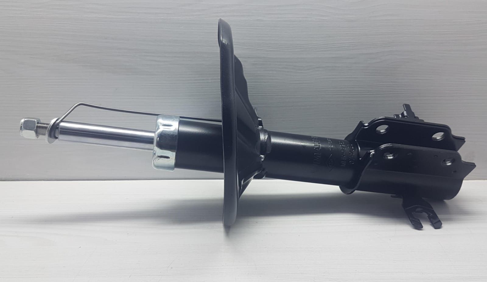 323 amortisör ön sol 1990-1995